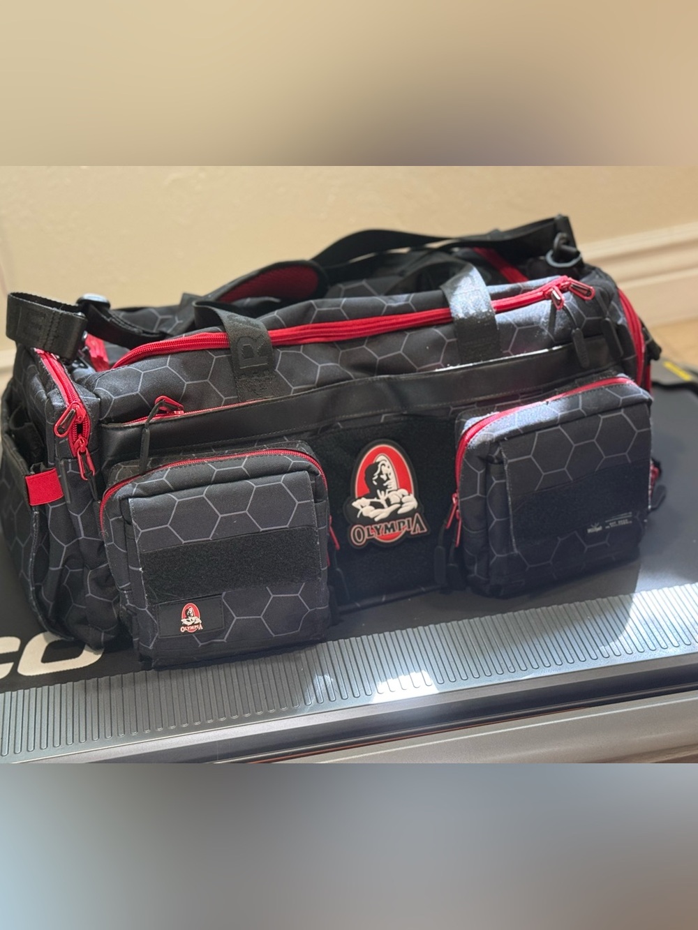 40L WOLFPACK Olympia 2023 Honeycomb pattern Duffel Bag in Black & Red